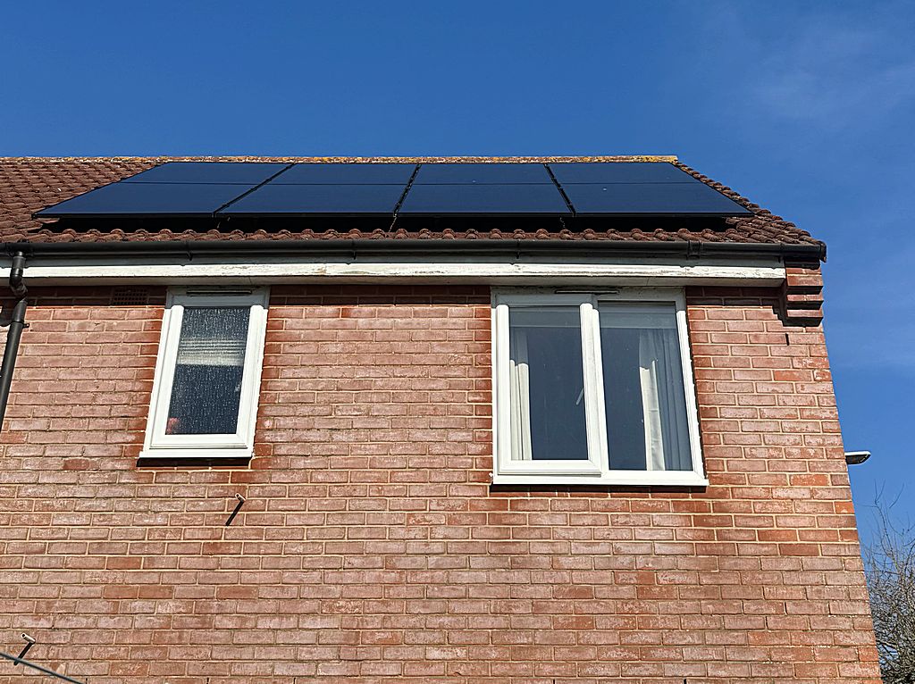 Modern solar panels on house roof - close view